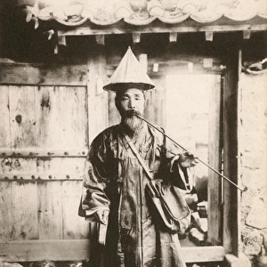 Old Chinese Postman in Traditional attire