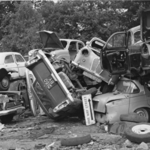 Pile of old cars in a junk yard