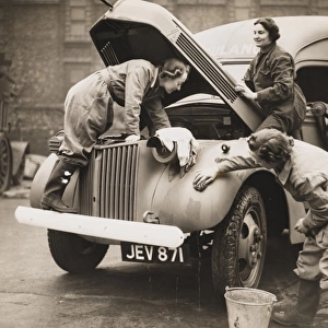 Women washing an ambulance WWII