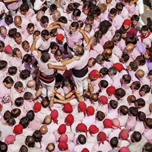 Castell human tower in front of the City Hall during the Festa Major Festival