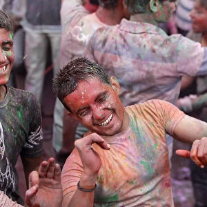 Men celebrating Holi festival, Barsana, Uttar Pradesh, India, Asia