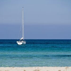 Moored yacht and beach