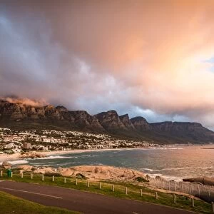 Sunset and clouds over Camps Bay, Table Mountain and the Twelve Apostles, Cape Town
