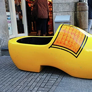 Giant wooden souvenir clog outside a souvenirs shop for clogs in Amsterdam, Holland