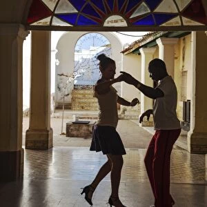 Cuba, Trinidad, Casa de Culture, Couple salsa dancing