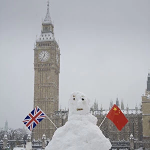 Snowman infront of Houses of Parliament and Big Ben, Westminster, London, England, UK