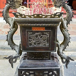 Urn with dragons inside of Temple of Literature, Dong Da District, Hanoi, Vietnam
