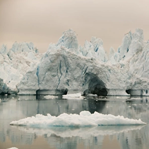 Icebergs from the Jacobshavn glacier or Sermeq Kujalleq drains 7% of the Greenland ice sheet and is the largest glacier outside of Antarctica. It calves enough ice in one day to supply New York with water for one year. It is one of the fastest