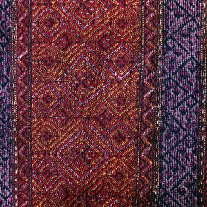 BANGLADESH, Crafts, Textiles Detail of red and purple woven murang pinon or loin cloth