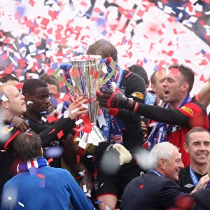 Rangers Football Club: Champions 2010-11 - Celebrating Victory with the Trophy