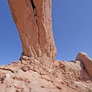 Looking up at the arch of North Window at Arches National Park. These arches are made from Entrada Sandstone which over