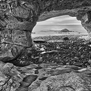 Canada, Newfoundland, The Arches Provincial Park, Rock cave on shore of Gulf of St