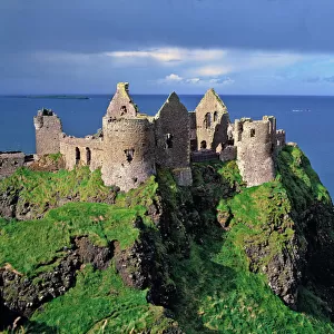 Northern Ireland, County Antrim, Dunluce Castle. Picturesque Dunluce Castle attracts