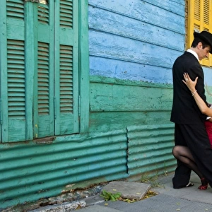 South America, Argentina, Buenos Aires, La Boca. Couple showing one of many tango dance positions