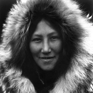 ALASKA: ESKIMO WOMAN. Noatak woman in Alaska wearing a hooded fur parka. Photographed by Edward S