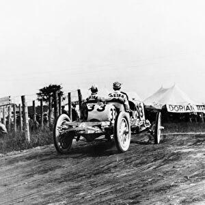 INDIANAPOLIS 500, 1911. Second-place finisher Ralph Mulford driving a Lozier during