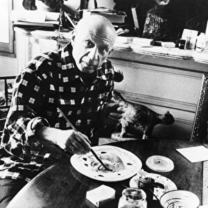 PABLO PICASSO (1881-1973). Spanish painter and sculptor. Working on a ceramic. Photograph