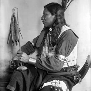 SIOUX NATIVE AMERICAN, c1900. Shooting Pieces, a Sioux Native American from Buffalo