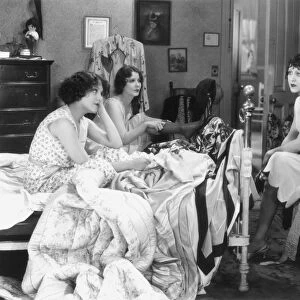 TWIN BEDS, 1929. Nita Martin, Jocelyn Lee, and Patsy Ruth Miller in a scene from the silent film; American