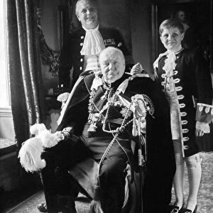 WINSTON CHURCHILL (1874-1965). Sir Winston Leonard Spencer Churchill. English statesman and writer. Photographed by Toni Frissell, c1950s, wearing coronation robes with his son Randolph and grandson standing behind him
