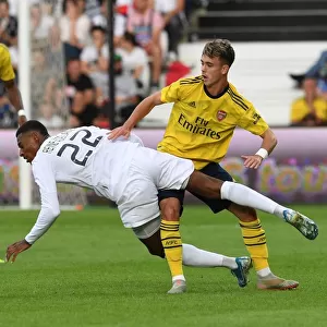 Arsenal vs Angers: Robbie Burton Challenges Jeff Reine-Adelaide in Pre-Season Friendly