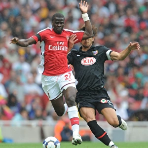 Arsenal's Eboue vs. Athletico's Dominguez: A Clash at the Emirates Cup, 2009
