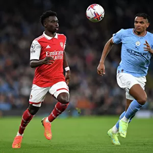 Battling for Possession: Saka vs. Akanji - Manchester City vs. Arsenal, Premier League 2022-23