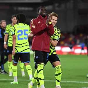 Emotional Reunion: Martin Odegaard and Charles Sagoe Jr after Arsenal's Carabao Cup Victory at Brentford