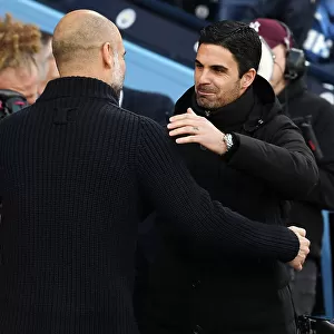 Manchester Rivalry: Mikel Arteta and Pep Guardiola Embrace Before Arsenal-Man City Clash (2022-23)