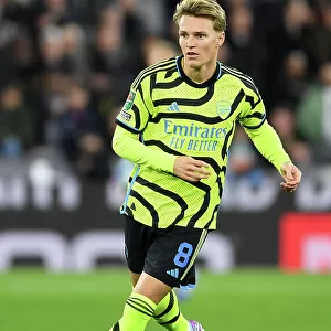 Martin Odegaard Focuses Intently: West Ham United vs Arsenal, Carabao Cup 2023-24