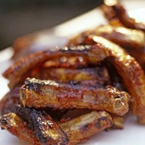Pile of grilled spare ribs, close-up