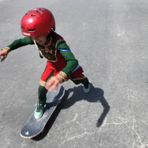 Afghan Skateboarders in Traditional Clothing Print Afghan Skateboarders in Traditional Clothing Print