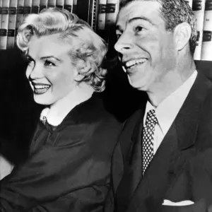 American Actress Marilyn Monroe Poses with her husband Joe Di Maggio American Actress Marilyn Monroe Poses with her husband Joe Di Maggio