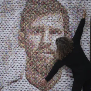 Print of a large-scale mural made from football stickers of Messi Print of a large-scale mural made from football stickers of Messi