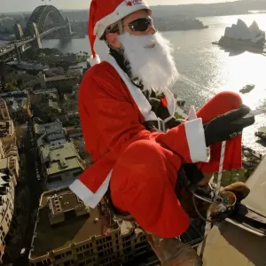 Print of Santa abseiling in Sydney Print of Santa abseiling in Sydney