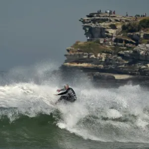 Print of a surfer riding a wave on Bondi Beach