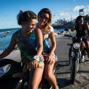 Brazil-Lifestyle Print: Women on Motorbikes along the Beach