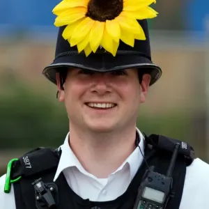 Print of a police officer at Glastonbury festival Print of a police officer at Glastonbury festival