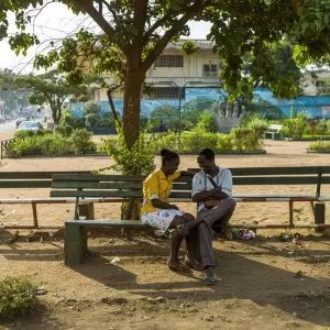 A couple speaks in a park in the centre of Bangui, Central African Republic, on February 13