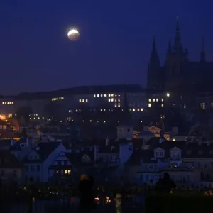 Print of Moon Eclipse over Prague Castle