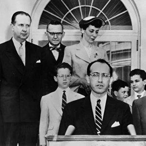 Dr Jonas E. Salk, who developed the anti-polio vaccine, speaking at a White House ceremony after President Eisenhower presented him with a presidential citation