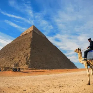 Egyptian Policeman on Camel near Khafre Pyramid Print