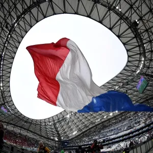 France fans waving the national flag at Velodrome stadium France fans waving the national flag at Velodrome stadium