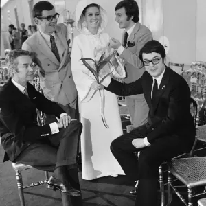 Print of four fashion designers presenting a wedding dress Print of four fashion designers presenting a wedding dress