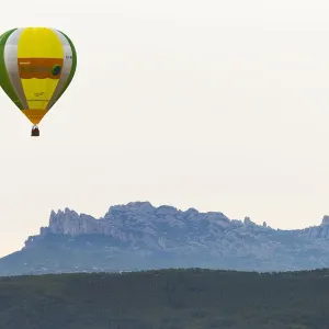 A hot-air balloon flies during the 21th European Balloon Festival in Igualada, near A hot-air balloon flies during the 21th European Balloon Festival in Igualada, near