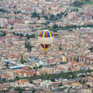 Print of a hot-air balloon over Igualada, Spain Print of a hot-air balloon over Igualada, Spain
