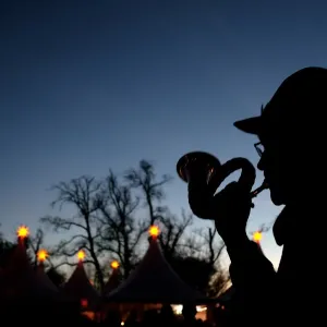 Hunters blow the hunting horn at the annual Christmas Market at the castle of Goedens in Sande Hunters blow the hunting horn at the annual Christmas Market at the castle of Goedens in Sande