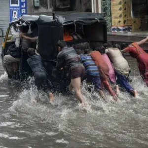 India Weather Print: Flooded Street Scene India Weather Print: Flooded Street Scene