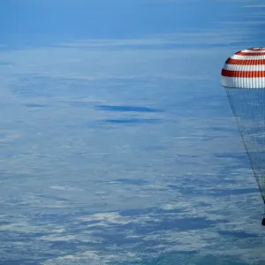 Print of Soyuz MS-11 capsule landing in Kazakhstan