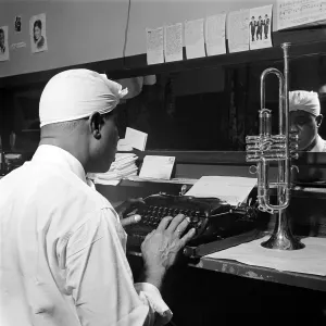 Louis Armstrong Typing not Trumpeting Louis Armstrong Typing not Trumpeting